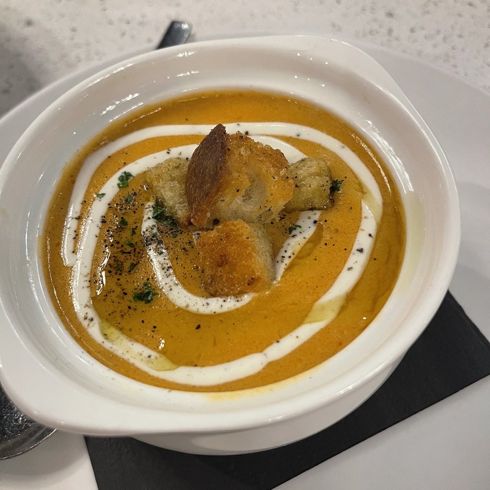 Lobster Bisque ($14). It was ok. Croutons were a bit stale and the cream was cracking and not very smooth.