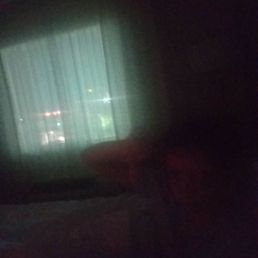 There were only sheers for curtains and the lights from the parking lot and other businesses were brutal