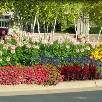 Greenside - a flower bed in front of a building - Landscaping Near Me - Savage, Minnesota Greenside - a flower bed in front of a building - Landscaping Near Me - Savage, Minnesota