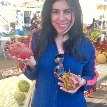 Ray Subtropical Farm - a woman holding a bowl of fruit - Farmers Market Near Me - Del Mar, California Ray Subtropical Farm - a woman holding a bowl of fruit - Farmers Market Near Me - Del Mar, California