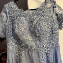 Stitches Etc - A bridesmaid dress I need hemmed and taken in a little from the top. I need it before Friday the 26th