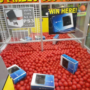 Six Flags St. Louis - This is the impossible claw machine... I hope someone wins one of these PlayStation 4s. Woot. - Amusement Parks Near Me - Eureka, Missouri