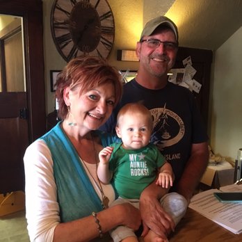 The 501 Winery - a man and woman with a baby - Wineries Near Me - Childress, Texas