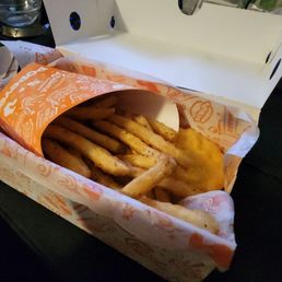 Half empty box of fries I was greeted with when I opened my box at home. This is theft. Half empty box of fries I was greeted with when I opened my box at home. This is theft.