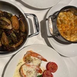 Ribeye cap, filet with crab stuffed shrimp, macaroni and cheese,  and Crispy Brussels Sprouts & Bacon