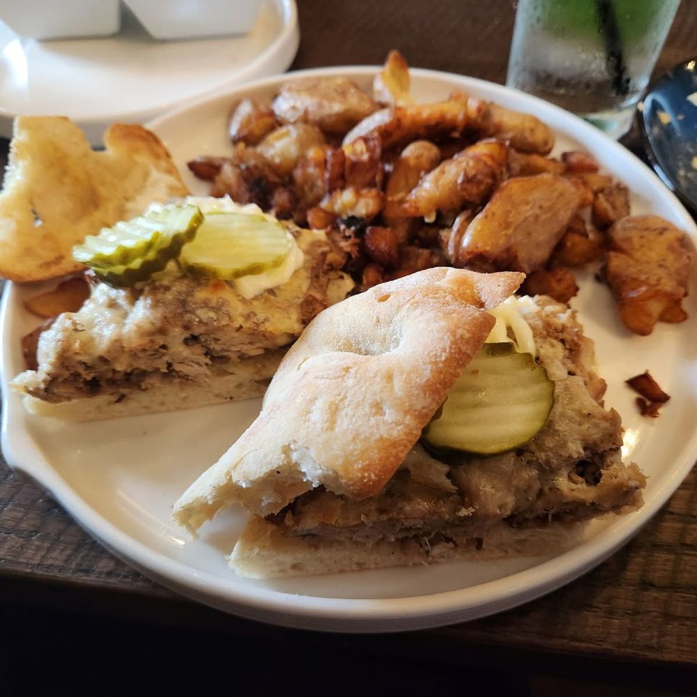 Duck cubano, potatoes, and mojito