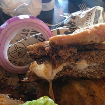 Steamworks Pub - Yummy cheese filling topped with pulled pork - Pubs Near Me - New Port Richey, Florida