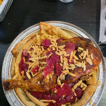Chickenhug - Musakhan (half chicken over flatbread with olive oil, slivered almonds, sumac, and onions). Phenomenal. - Chicken Shop Near Me - Tempe, Arizona