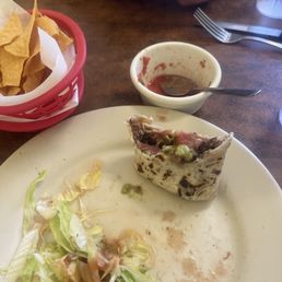 Carne asada burrito and chips Carne asada burrito and chips