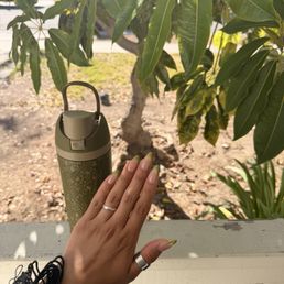 Acrylic set with a green french tip Acrylic set with a green french tip