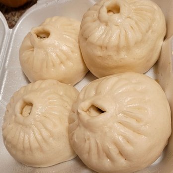 Myung In Dumplings - a container of dumplings - Korean Near Me - Los Angeles, California Myung In Dumplings - a container of dumplings - Korean Near Me - Los Angeles, California