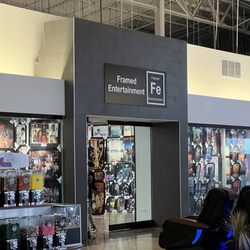 Framed Entertainment - Store entrance - located next to Samsonite and across from Marshall's.
