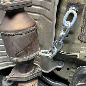 Canyon Muffler - heavy duty chain welded to catalytic converter and frame - Auto Repair Near Me - Canyon Cntry, California Canyon Muffler - heavy duty chain welded to catalytic converter and frame - Auto Repair Near Me - Canyon Cntry, California