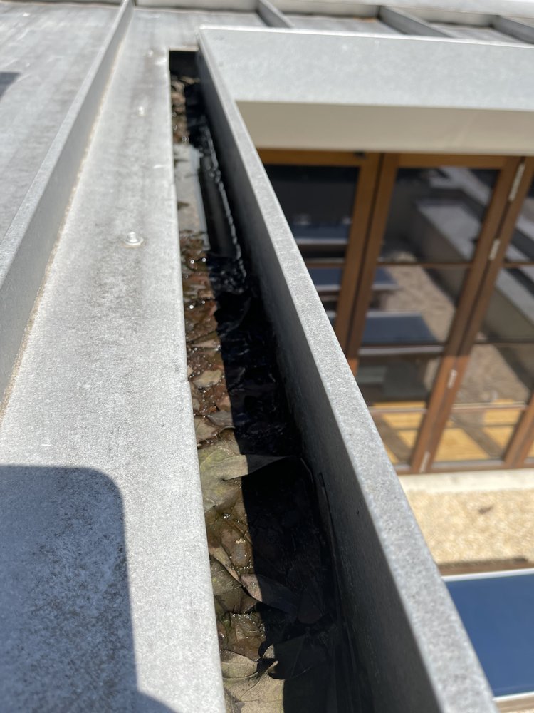 Slide of Marcus Gutters Cleaning