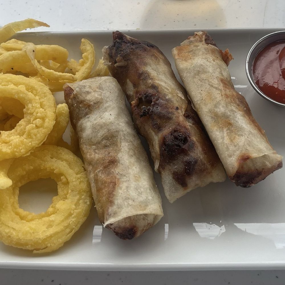Burtons Grill & Bar - Cheesesteak Spring Rolls - New American Near Me - Mansfield, Massachusetts Burtons Grill & Bar - Cheesesteak Spring Rolls - New American Near Me - Mansfield, Massachusetts