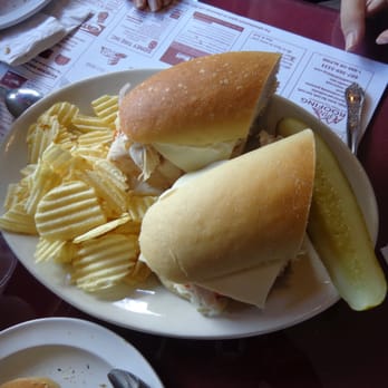 Roma Ristorante & Pizzeria - a plate of sandwiches and chips - Pizza Near Me - Sidney, New York Roma Ristorante & Pizzeria - a plate of sandwiches and chips - Pizza Near Me - Sidney, New York