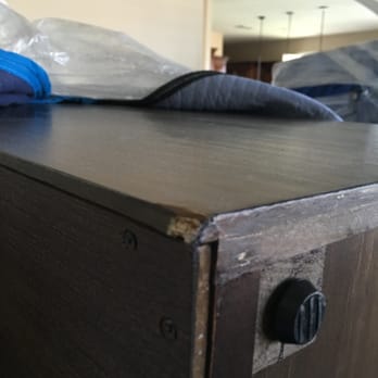 Scout Moving & Storage - Chunks of wood missing from brand new entertainment center. This damage is all over, as well as scratches on the table surface - Movers Near Me - Kent, Washington Scout Moving & Storage - Chunks of wood missing from brand new entertainment center. This damage is all over, as well as scratches on the table surface - Movers Near Me - Kent, Washington