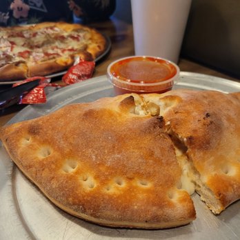 Pienezza Pizza - Cheese Calzone - Pizza Near Me - Kissimmee, Florida Pienezza Pizza - Cheese Calzone - Pizza Near Me - Kissimmee, Florida
