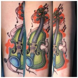 Art In Motion Tattoo