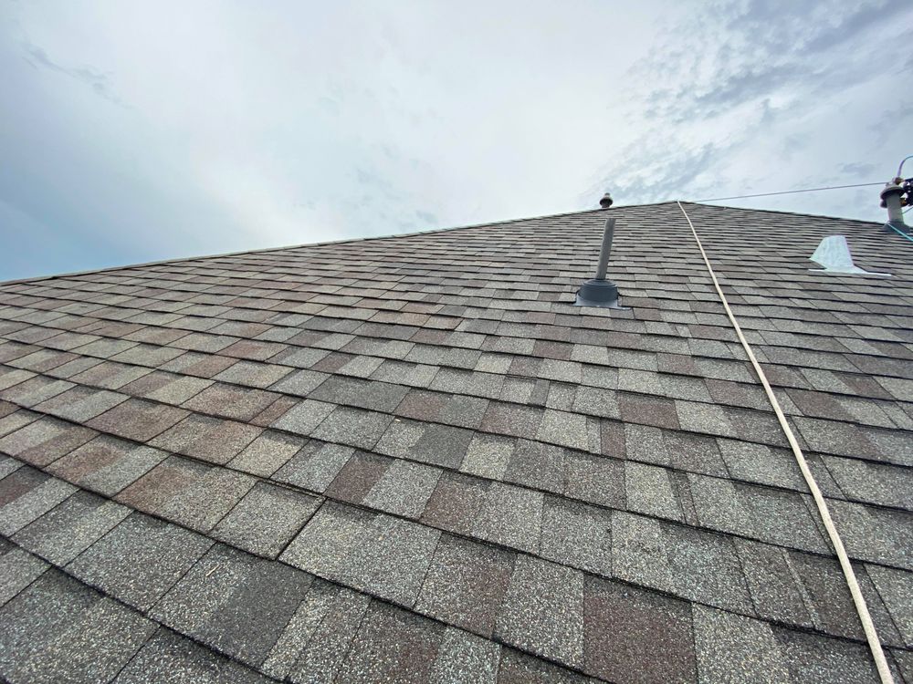 Slide of CM Roofing Pros