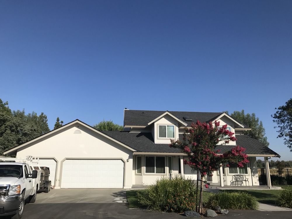 Slide of T&K Roofing