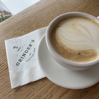 Grinder’s Coffee Bar - Hazelnut oat milk latte - Coffee & Tea Near Me - Houston, Texas