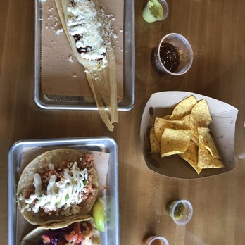 Taco Madre - Pork tamale with mole & crema on top. Tinga chicken taco and Rosarito Mahi Taco. - Mexican Near Me - Naperville, Illinois