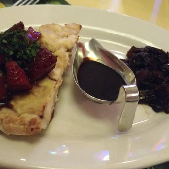 Rhythm Cafe - Goat cheese pie with carmalized onions and balsamic drizzle. - New American Near Me - West Palm Beach, Florida