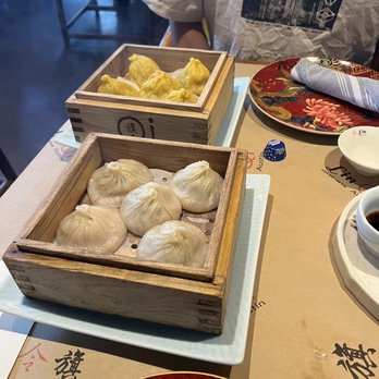 Qi Austin - Shanghai Soup Dumpling (front) Crab Meat Fish Maw Soup Dumpling (back) - Dim Sum Near Me - Austin, Texas