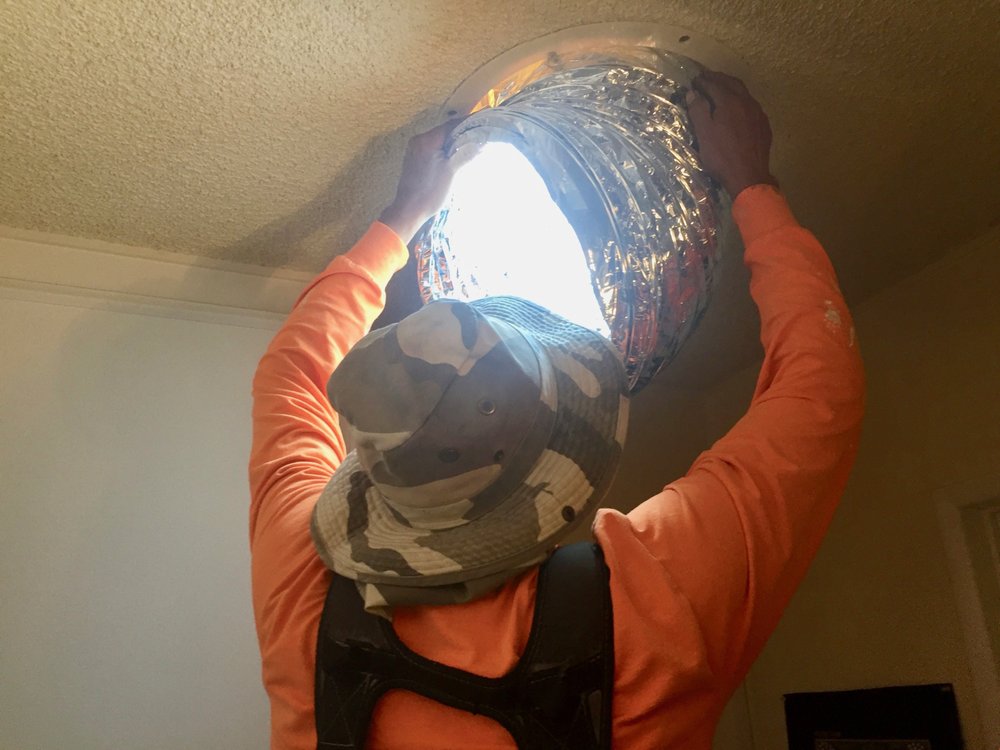 Slide of Economy Roofing