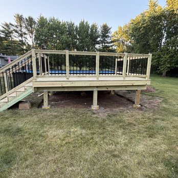 Infinity Fence & Deck Solutions - Treated, yellow pine, wood, pool deck. This residential pool deck is located in Marengo. - Fences & Gates Near Me - Algonquin, Illinois Infinity Fence & Deck Solutions - Treated, yellow pine, wood, pool deck. This residential pool deck is located in Marengo. - Fences & Gates Near Me - Algonquin, Illinois