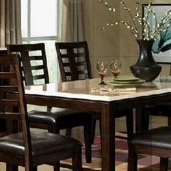Grand Furniture - No one will miss a meal with this lovely seven-piece dinette set.
