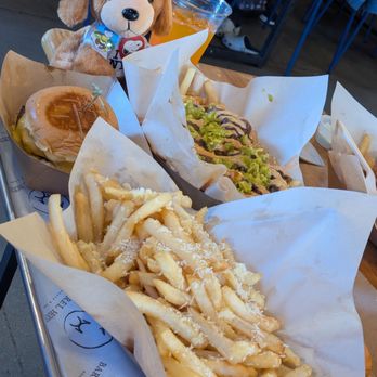 Moksa Barrel House - My garlic fries, hubby's burger and chili fries in back. (Bruno's cousin, Uno. Uno wears Peanuts pins. Bruno wears Yelp pins.) - Beer Bar Near Me - Roseville, California