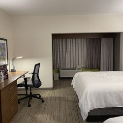 Holiday Inn Express - Lompoc - Microwave oven, coffee maker and mini fridge behind the wall next to the air conditioning unit.