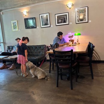 Esso Coffeehouse - two people and a dog - Coffee Roasteries Near Me - Phoenix, Arizona Esso Coffeehouse - two people and a dog - Coffee Roasteries Near Me - Phoenix, Arizona
