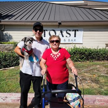 Toast Kitchen & Bar - My boyfriend, our puppy, and his grandma on her birthday! I introduced her to TOAST and she loves it here! - Breakfast & Brunch Near Me - Brea, California Toast Kitchen & Bar - My boyfriend, our puppy, and his grandma on her birthday! I introduced her to TOAST and she loves it here! - Breakfast & Brunch Near Me - Brea, California