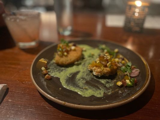 Photo of Central - Montgomery, AL, US. a plate of food on a wooden table