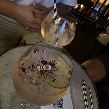 Antidote - The generous gin and tonics, served in large crystal water glasses. - Cocktail Bars Near Me - Asheville, North Carolina Antidote - The generous gin and tonics, served in large crystal water glasses. - Cocktail Bars Near Me - Asheville, North Carolina