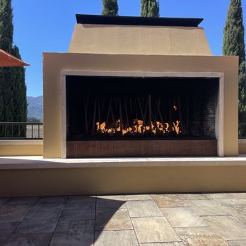 Round Pond Estate - Massive fireplace on the patio - Wineries Near Me - Rutherford, California Round Pond Estate - Massive fireplace on the patio - Wineries Near Me - Rutherford, California