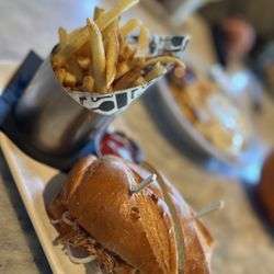 The Golden Pig - Banh Mi with pulled pork, the pork has no flavor. Not enough pickled vegetable. The only great things are Baguette and fries.