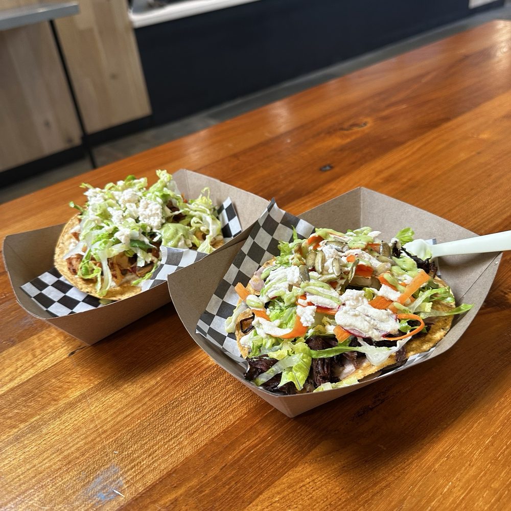 Tostada de Tinga (left) Tostada Ranchera (right) Tostada de Tinga (left) Tostada Ranchera (right)