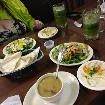 Aladdin Cafe - Greek salad, fatoosh salad, a cup of lentil soup, and a side of babaganouge with fresh pita. - Mediterranean Near Me - Crowley, Texas