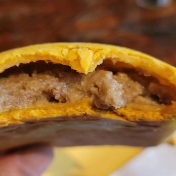 Reggae Hut - Inside of the delicious beef patty - Caribbean Near Me - Houston, Texas Reggae Hut - Inside of the delicious beef patty - Caribbean Near Me - Houston, Texas