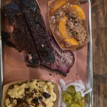 Pecan Lodge - 2 meat plate- brisket and ribs with mac and cheese Peach cobbler - Sandwiches Near Me - Dallas, Texas