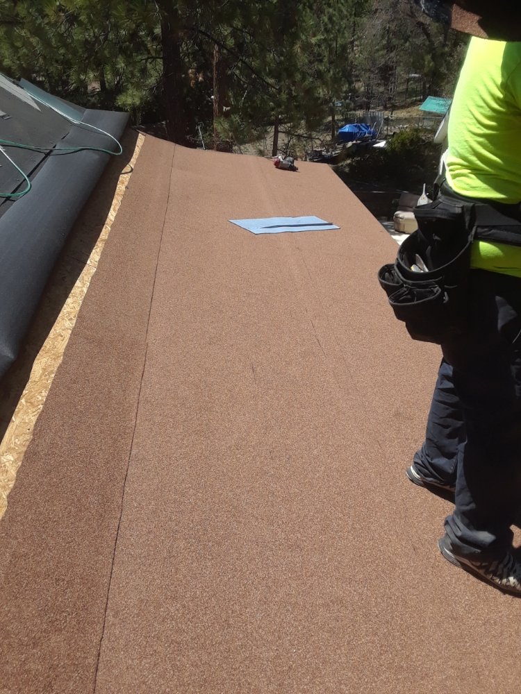 Slide of Eleazars Roofing