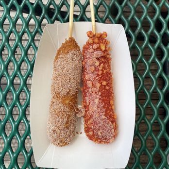 Seoul Hotdog - (left) mozzarella with spicy batter and (right) mozzarella with hot cheeto batter - Hot Dogs Near Me - Berkeley, California
