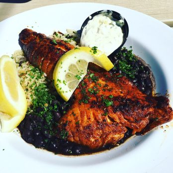 Mersea's - Blackened Cod over wild pilaf and black beans served with tartar sauce - Bars Near Me - Avila Beach, California Mersea's - Blackened Cod over wild pilaf and black beans served with tartar sauce - Bars Near Me - Avila Beach, California