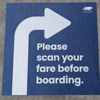 The Tide MacArthur Square Station - This is the direction arrow and the Please scan your fare before boarding. painted on the ground. Photo taken July 28, 2026. - Train Stations Near Me - Norfolk, Virginia The Tide MacArthur Square Station - This is the direction arrow and the Please scan your fare before boarding. painted on the ground. Photo taken July 28, 2026. - Train Stations Near Me - Norfolk, Virginia
