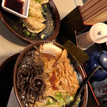 Fukuryu Ramen - In the back is the pan fried pork gyoza with a soy-based dipping sauce. In the front is the shio ramen. - Ramen Near Me - Upper Arlington, Ohio