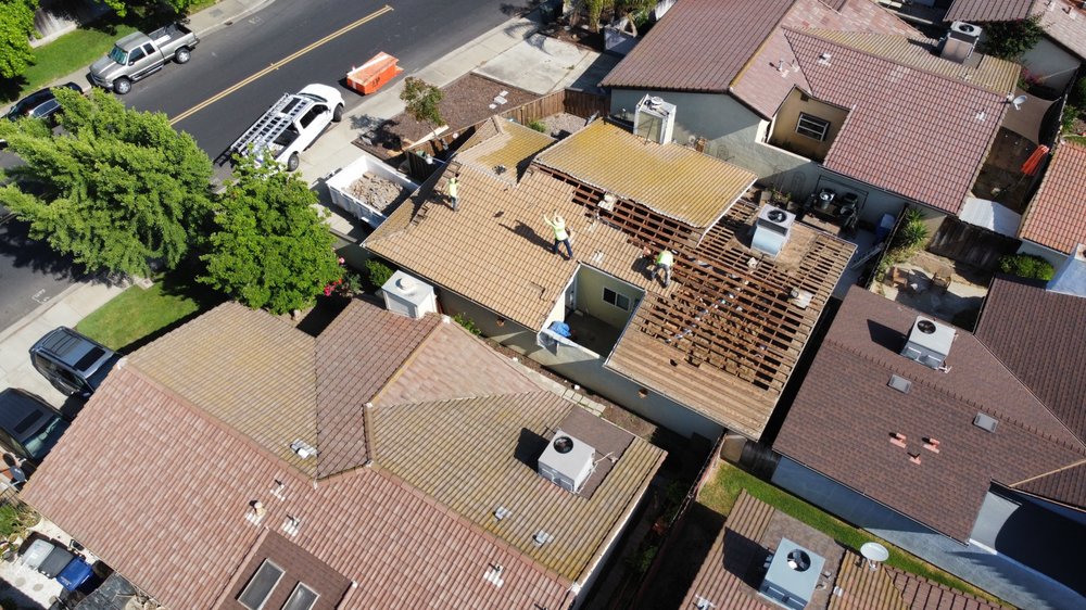 Slide of Legend Roofing Company